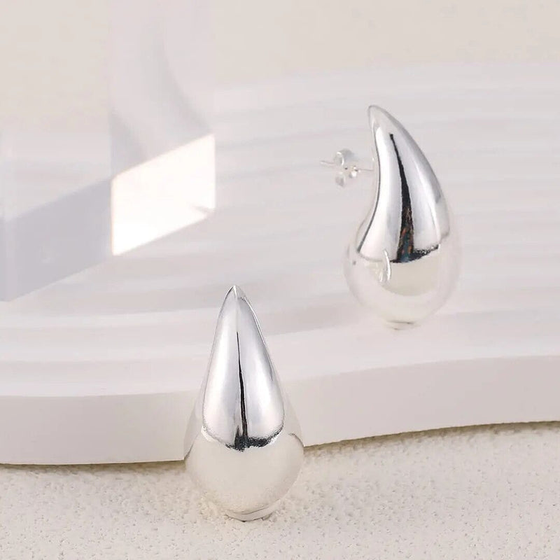 Teardrop Silver statement earrings