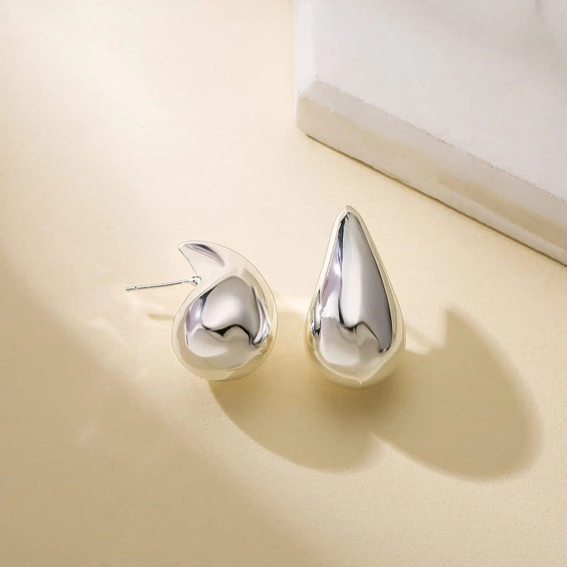 Teardrop Silver statement earrings
